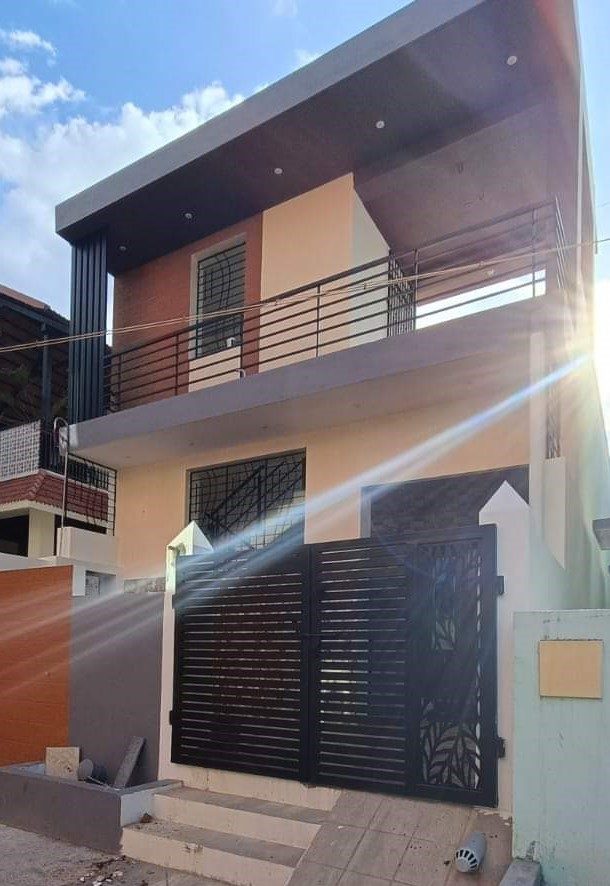Completed G+1 house with cantilevered balcony built by Gravitas Builders in Ariyur, Vellore